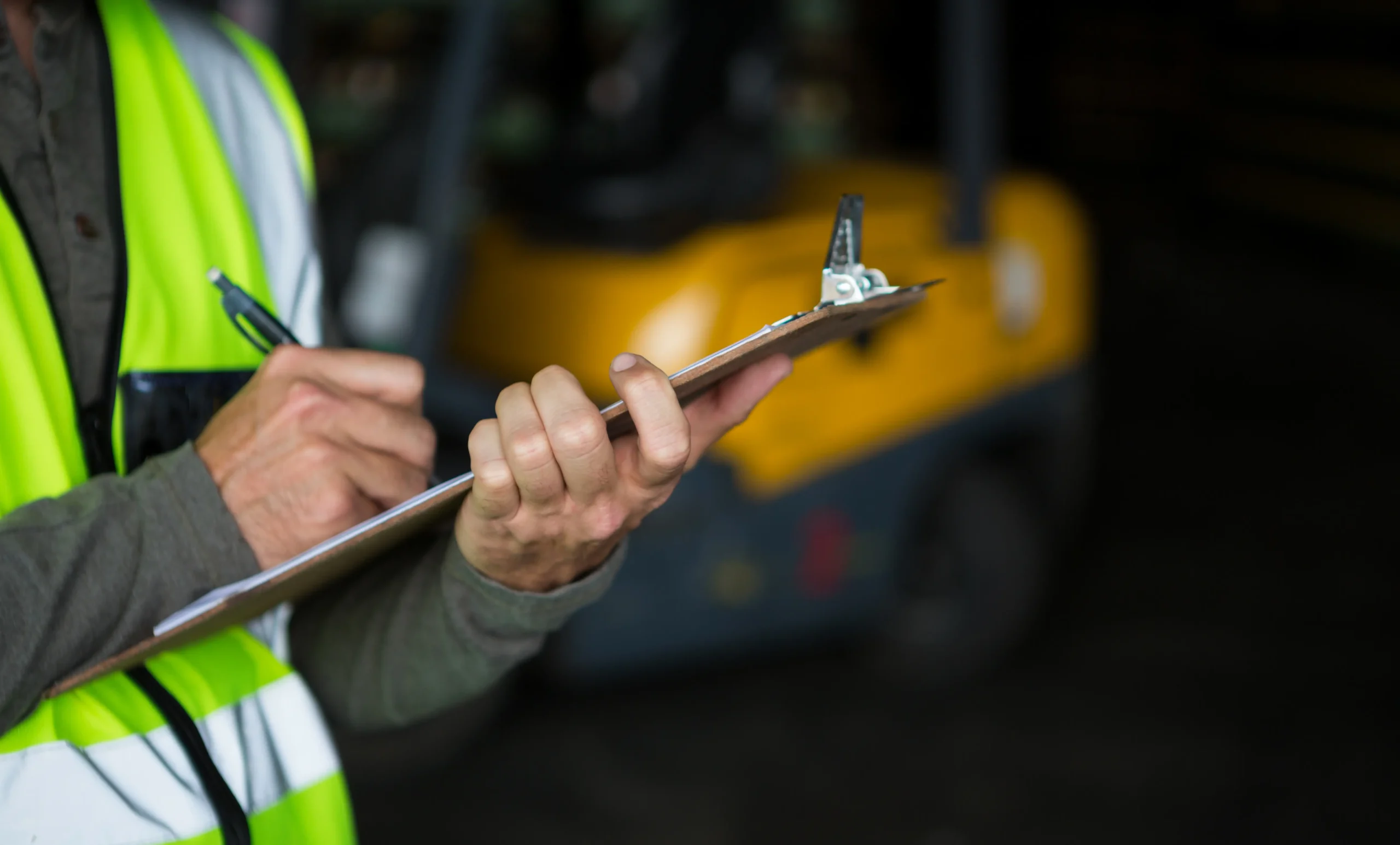 male-worker-writing-clipboard (2)